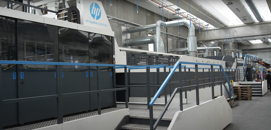 HP PageWide industrial printing press machinery in factory setting.
